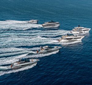 Close-up of a luxury yacht by Ferretti Group in the ocean.