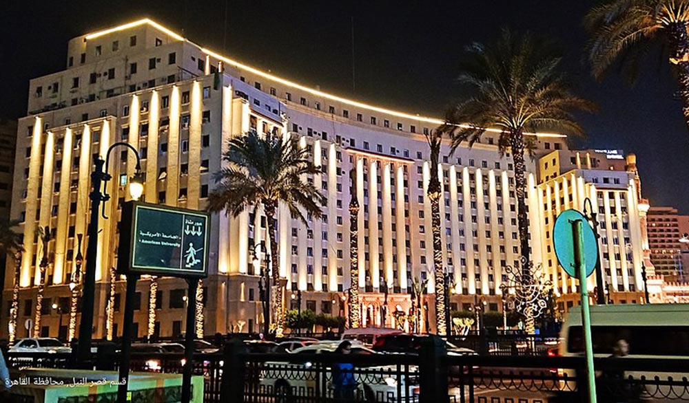 A night view of The Tahrir Complex building in Cairo, Egypt.